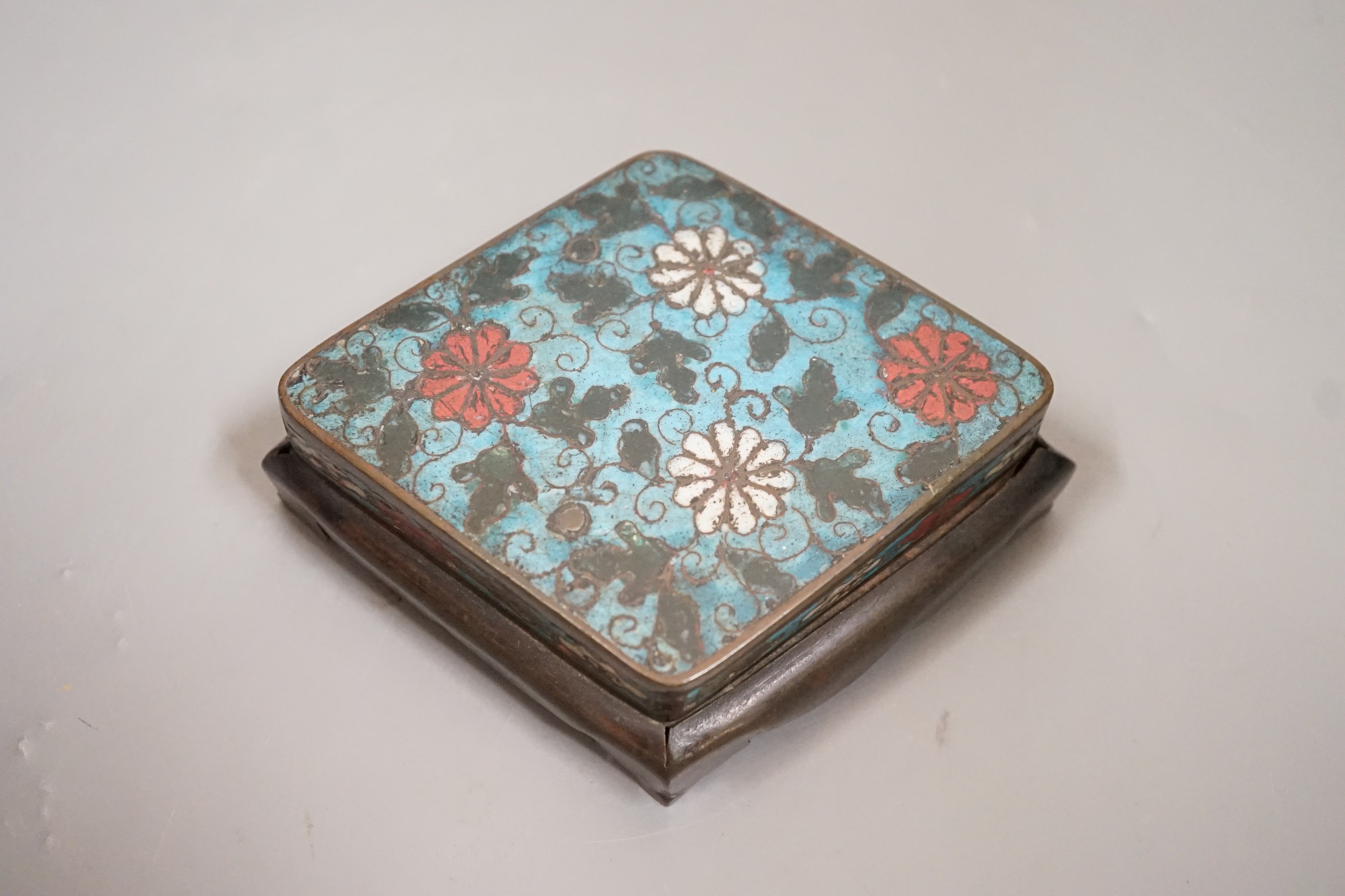 A Chinese Ming cloisonné enamel lozenge shaped stand, 15cms wide